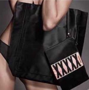 NWOT VS SATIN BAG WITH WRISTLET